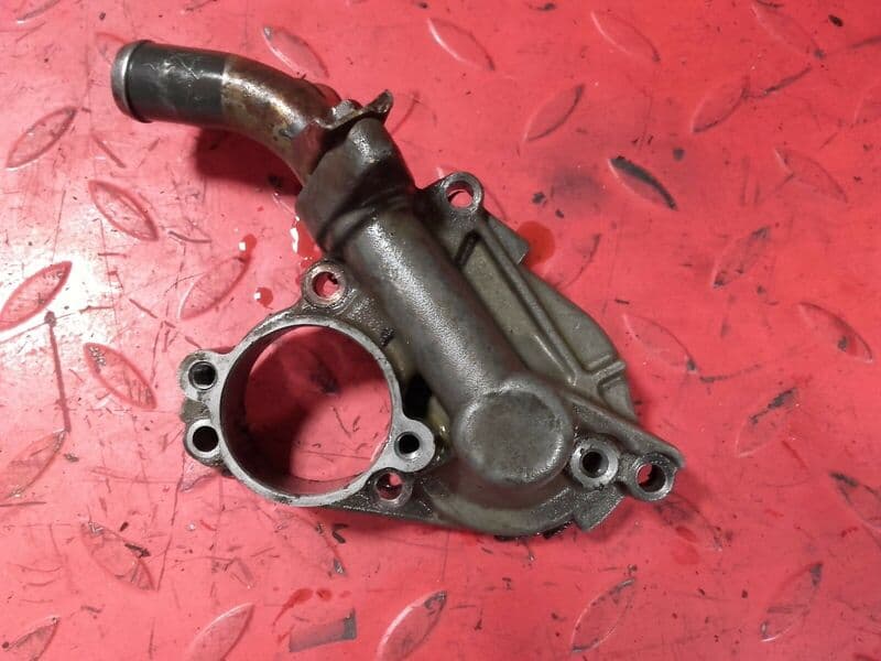 Carter de pompe à eau Kawasaki 250 KXF 04-05 — photo 1/2