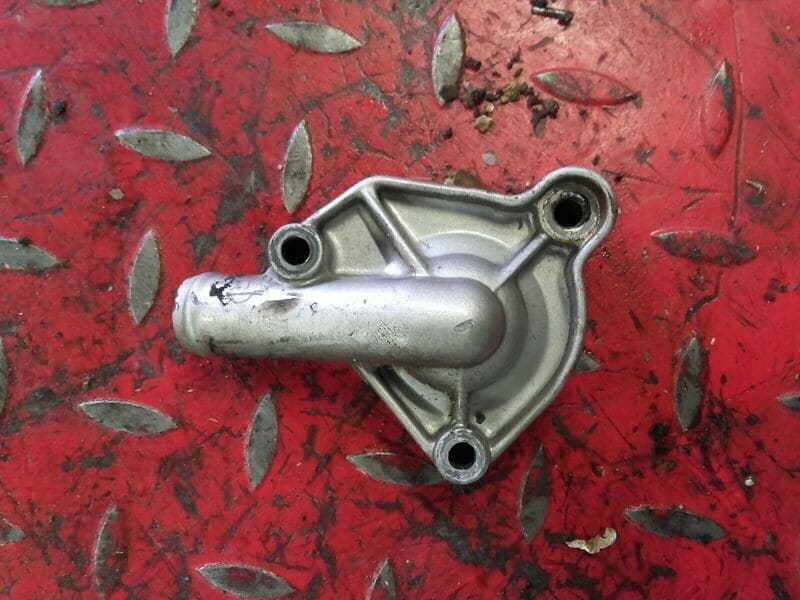 Carter couvercle de pompe à eau Honda 125 CRM jd13a — photo 1/2