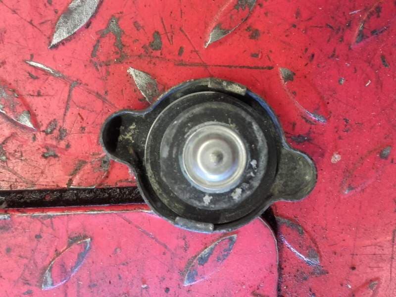 bouchon de radiateur Kawasaki 125 KMX 86-02 — photo 1/2